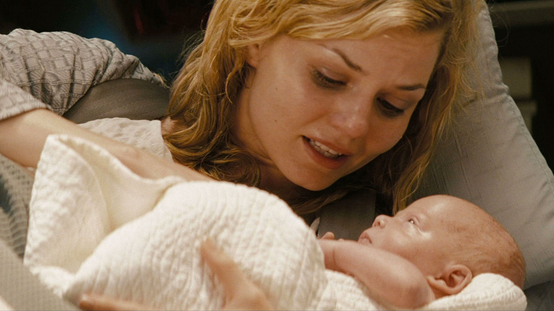 Winona Kirk, holding her newly born baby, James T. Kirk in Star Trek