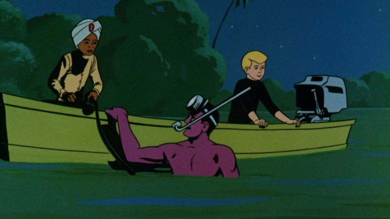 Hadji and Jonny Quest on a boat next to a purple man in the water in Jonny Quest