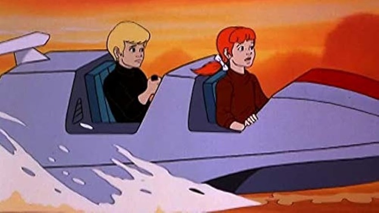 Una lancha rápida conducida por Johnny Quest y su amigo en Las nuevas aventuras de Johnny Quest