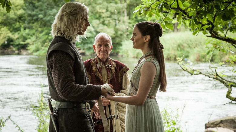 Rhaegar and Lyanna holding hands during their wedding ceremony on Game of Thrones