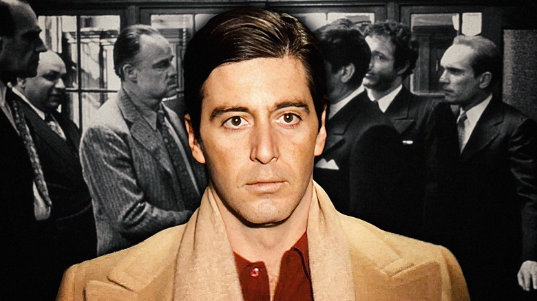 Young Al Pacino in front of a scene from The Godfather