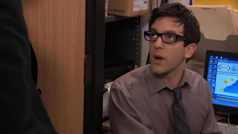 Ryan working in the closet on The Office