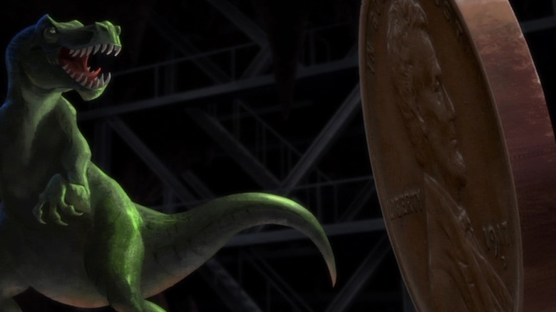 Dark Knight returns animated T-Rex and a giant penny in Batcave