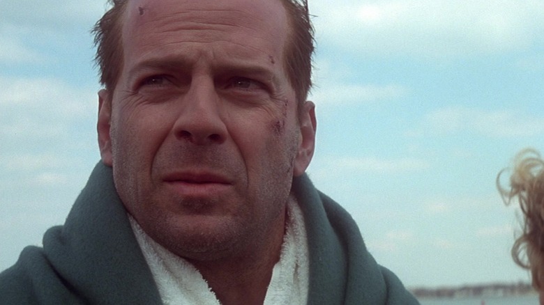 Bruce Willis as John McClane wrapped up in blankets in Die Hard with a Vengeance