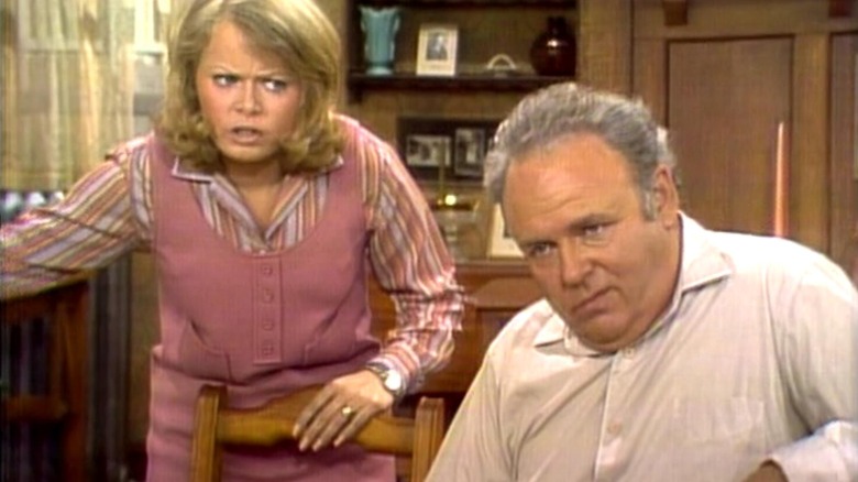 Archie Bunker sneering at his daughter in All in the Family.