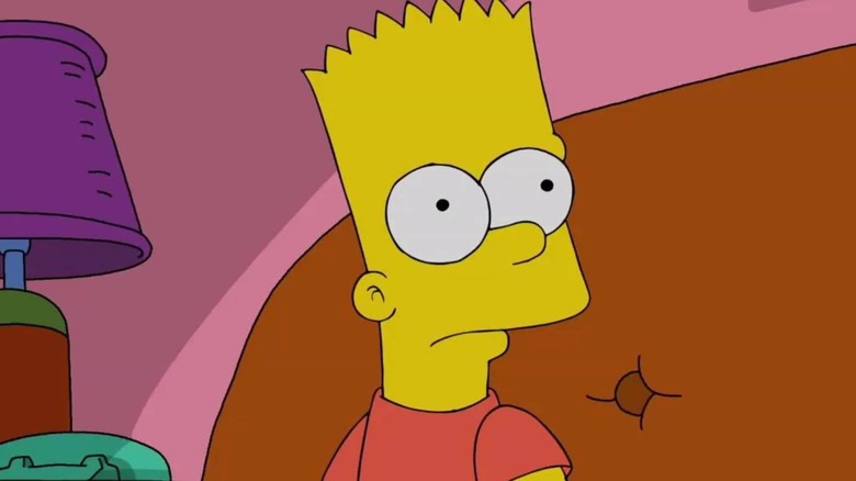 Bart Simpson sits on the sofa of Simpsons