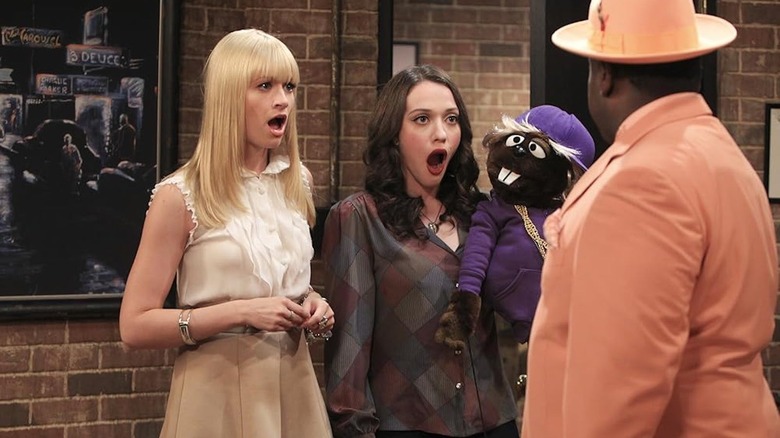 Kat Dennings, Beth Behrs, and a puppet in 2 Broke Girls