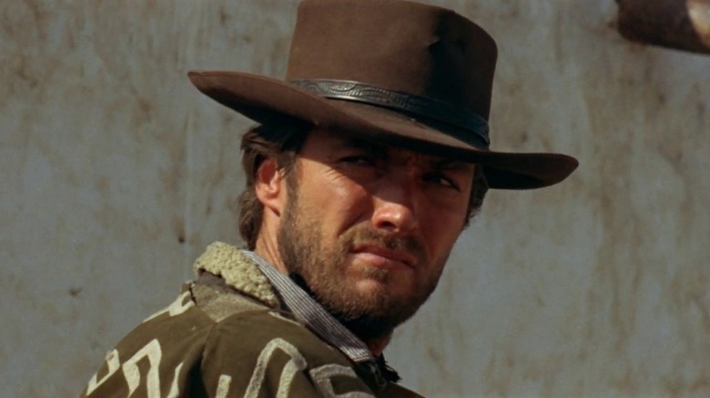 Clint Eastwood as the Man with No Name wearing a hat in A Fistful of Dollars