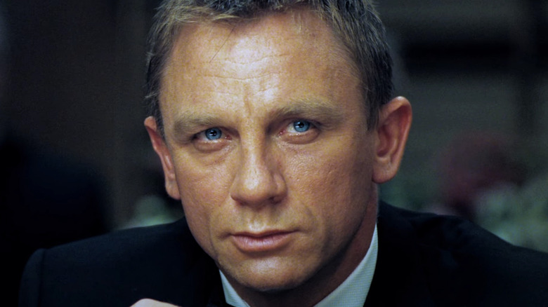 Daniel Craig's James Bond looks up while wearing a tuxedo in Casino Royale