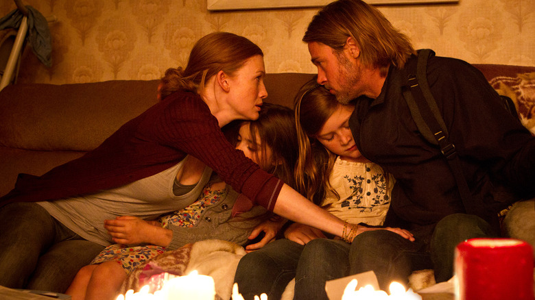 Brad Pitt comforting his family