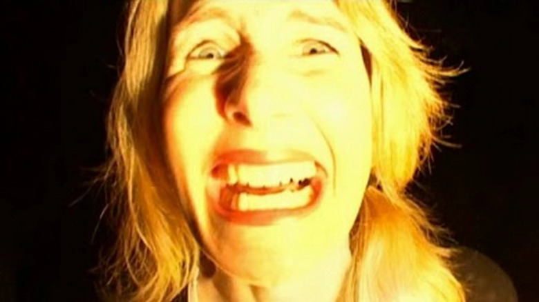 Laura Dern looking terrified in Inland Empire