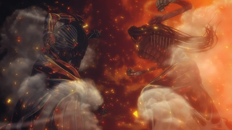 Armin and Eren about to punch each other in Colossal Titan form in Attack on Titan