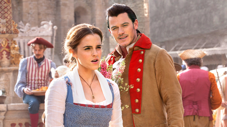 Belle ignores the advances of Gaston in Beauty and the Beast