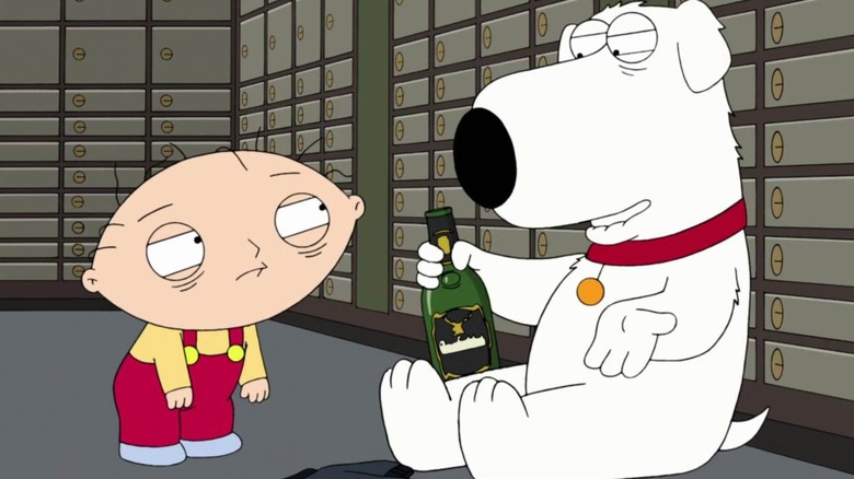 Stewie looking at Brian holding a bottle