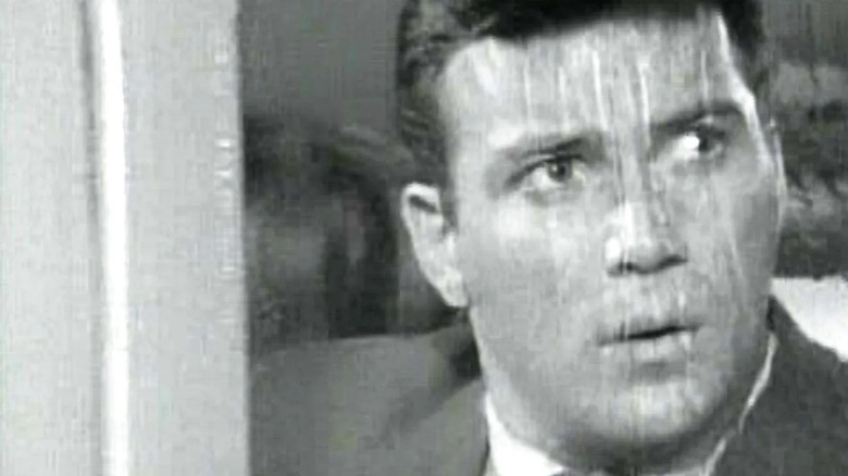 William Shatner looks through window Nightmare at 20,000 Feet