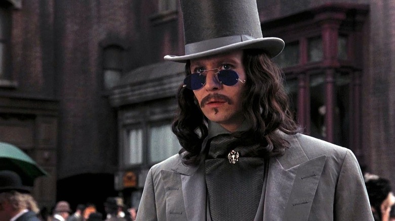 Dracula stars intensely at the distance under his cool little sunglasses in Bram Stoker's Dracula