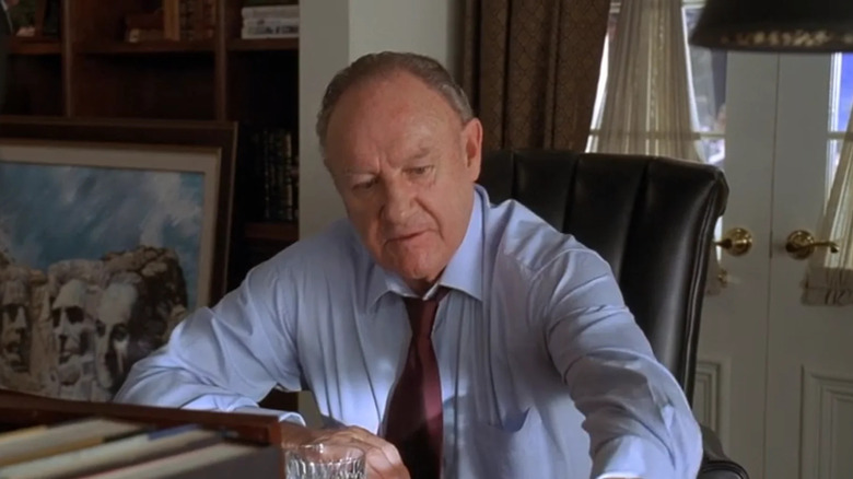 Eagle Cole sits at a desk in Welcome to Mooseport