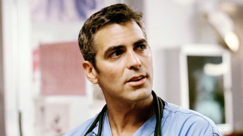 Doug Ross with short hair in scrapes looking aside in ER