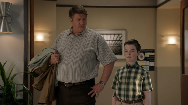 Lance Barber as George Cooper Sr. and Iain Armitage as Sheldon Cooper on Young Sheldon