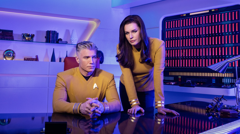 Anson Mount and Rebecca Romijn in a promo image for Star Trek: Strange New Worlds