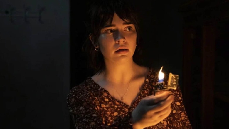 Sadie holding a lighter in The Boogeyman