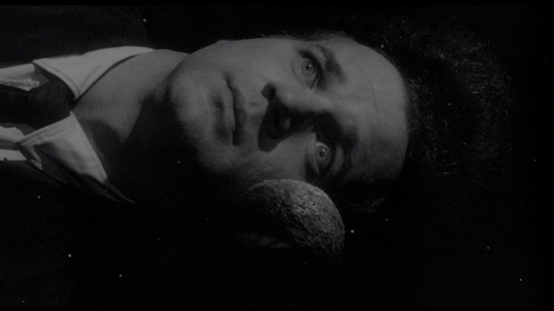 Henry Spencer floating in a black space in Eraserhead