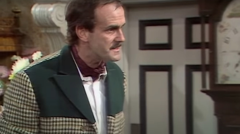 John Cleese as Basil in Fawlty Towers