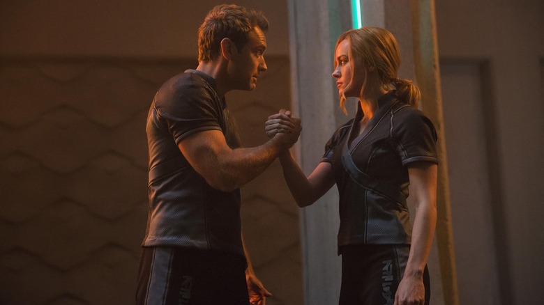 Yon-Rogg and Carol Danvers clasping hands in Captain Marvel