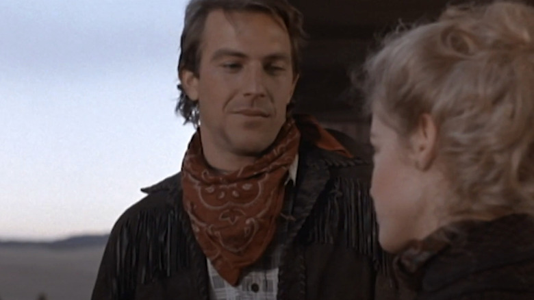 Kevin Costner's Jake smiles at a lady in Silverado