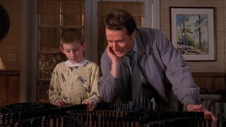 Erik Per Sullivan's Dewey and Bryan Cranston's Hal playing with dominoes on Malcolm in the Middle