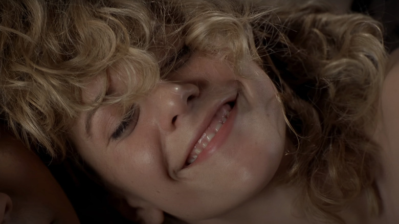 Sally Albright smiling in When Harry Met Sally