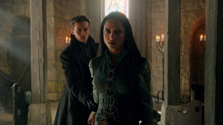 Freddy Carter as Kaz Brekker and Amita Suman as Inej Ghafa in Shadow and Bone