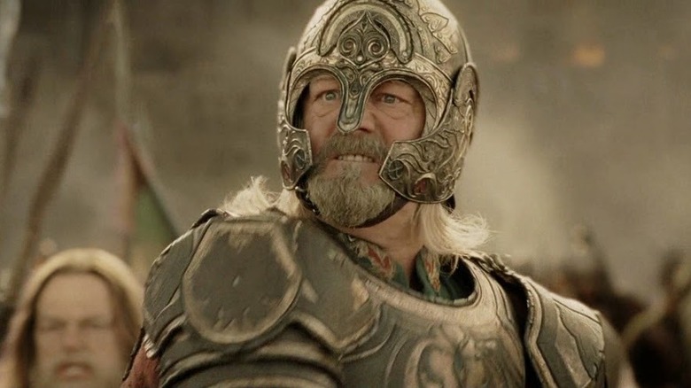 King Theoden riding his horse in battle in The Return of the King