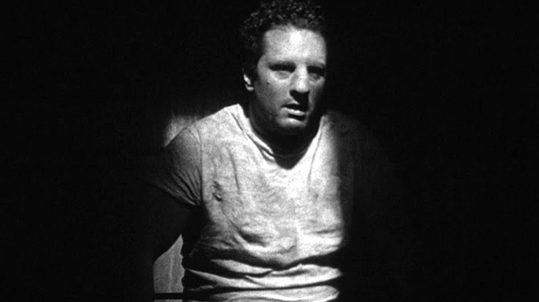 Robert De Niro as Jake LaMotta in Raging Bull