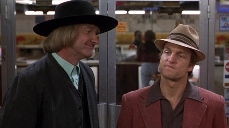 Randy Quaid as Ishmael beams at an annoyed Woody Harrelson as Roy Munson in Kingpin