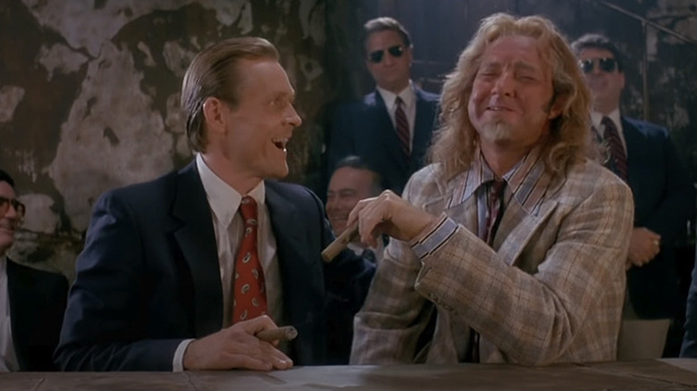 Randy Quaid and William Sadler share a cigar as Elijah C. Skuggs and Dick Brian in Freaked