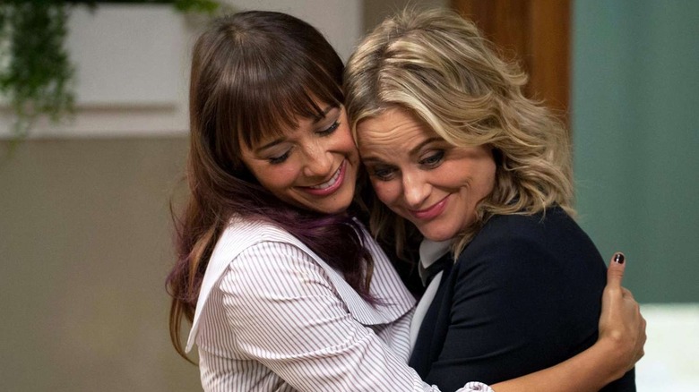 Ann Perkins and Leslie Knope hug