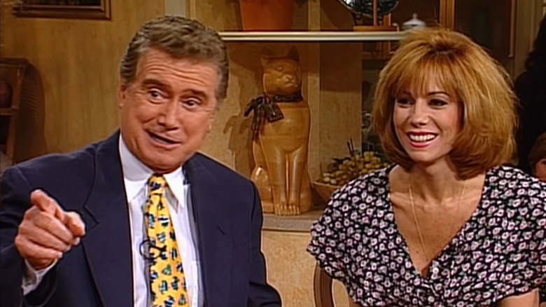 Regis Philbin pointing while Kathie Lee Gifford looks on in Seinfeld