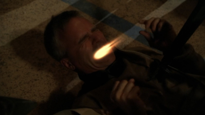 Richard Dean Anderson's Colonel Jack O Neill screams as he's stabbed in Stargate SG-1