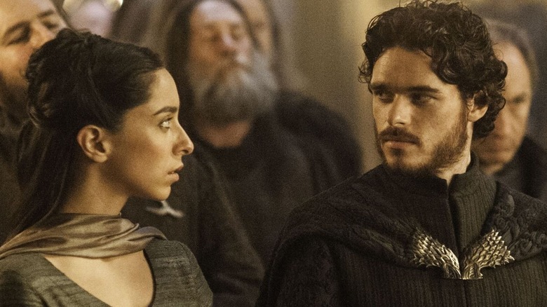 Oona Chaplin and Richard Madden as Talisa and Robb Stark