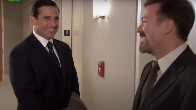 Michael Scott of Steve Karel meets David Brent on Ricky Gervais from lift in the office