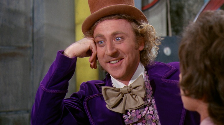 Willy Wonka, somehow looking both cheery and threatening in Willy Wonka & the Chocolate Factory.