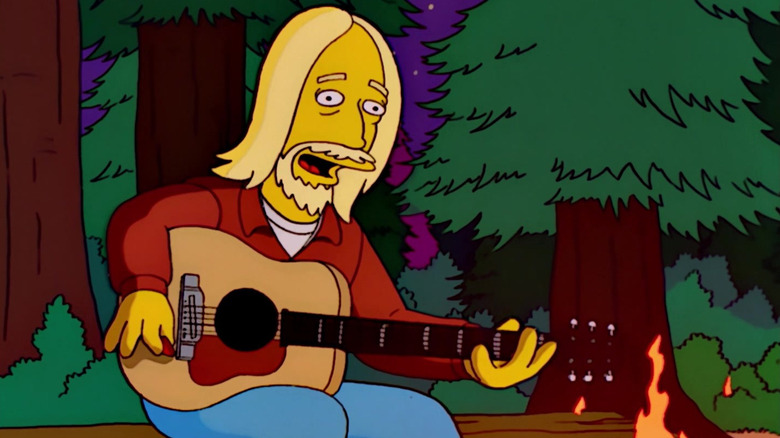 Animated Tom Petty with an acoustic guitar next to a campfire on The Simpsons