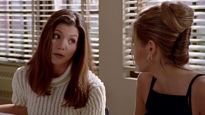 Charisma Carpenter and Sarah Michelle Gellar in Buffy the Vampire Slayer