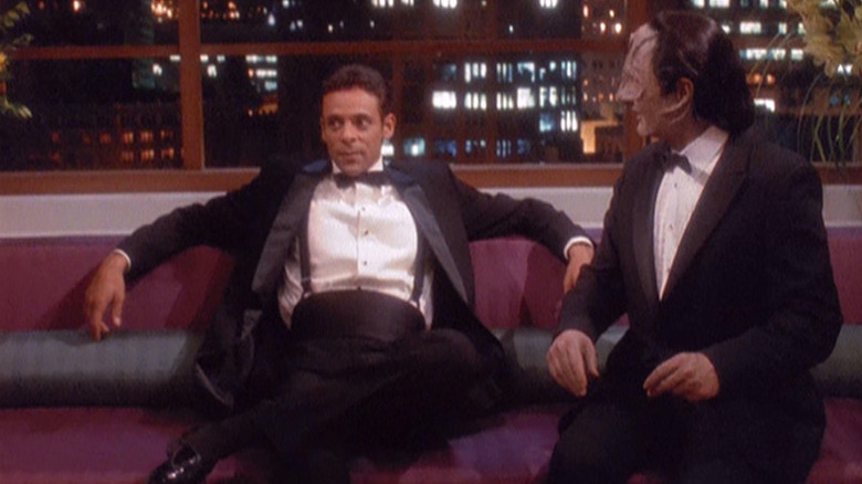 Alexander Siddig as Dr. Julian Bashir and Andrew Robinson as Elim Garak, dressed in tuxes, on Star Trek: Deep Space Nine