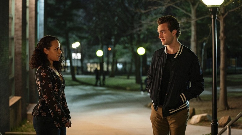 Chloe and Brendan standing outside on a campus in Mrs. Fletcher