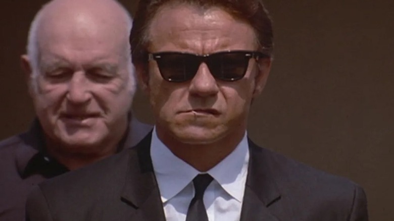 Harvey Keitel chews on a toothpick as Mr. White in Reservoir Dogs