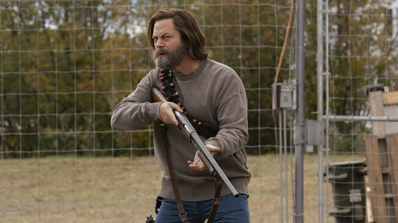 Nick Offerman as Bill holding his shotgun in The Last of Us