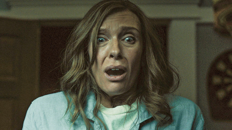 Toni Collette looking horrified in Hereditary