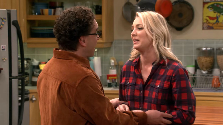 Leonard and Penny talking in the kitchen on The Big Bang Theory